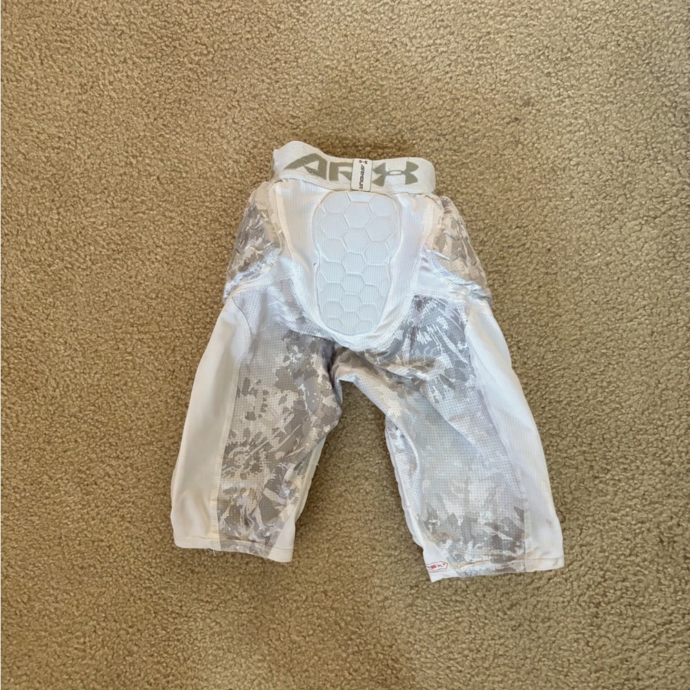 White Under Armour boys football girdle. Sz. YS
